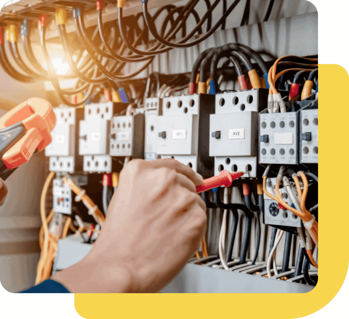 Electrician performing maintenance on circuit breaker panel