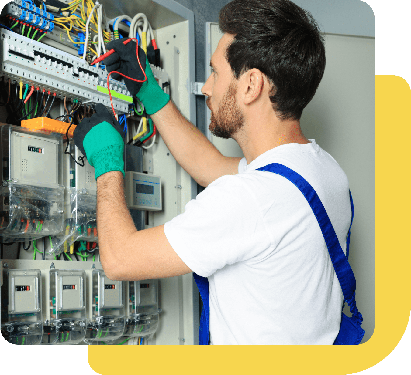 Electrician working on electrical panel in Cook County