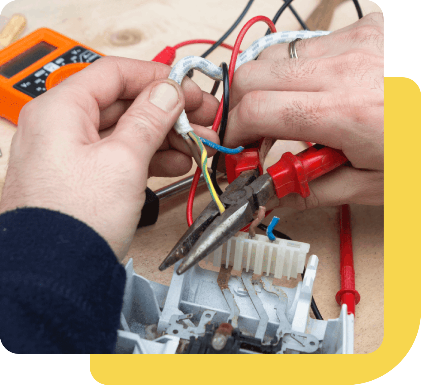 Group 659 A person working on electrical equipment with wires.